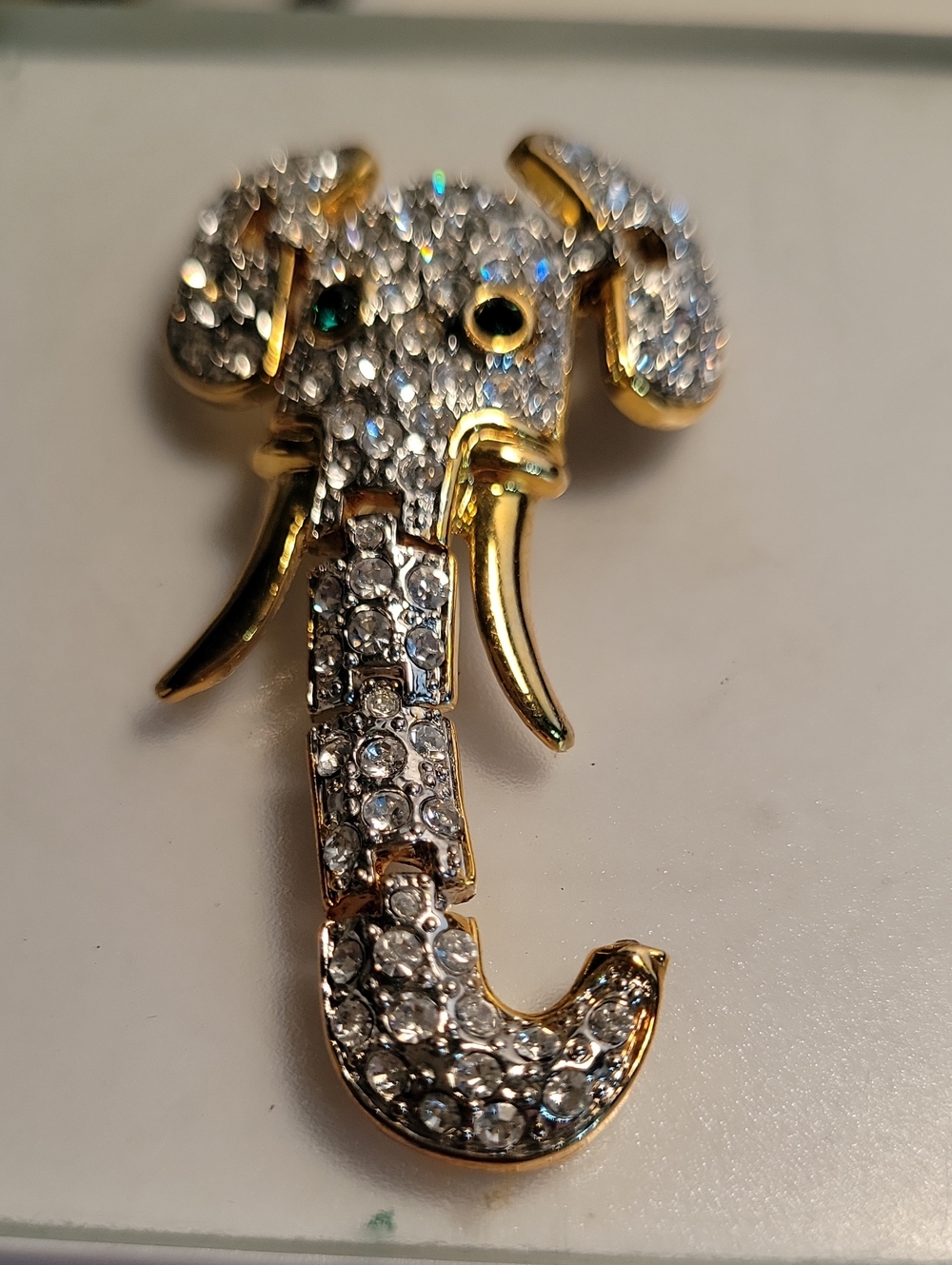 Gold-Tone Elephant Brooch with Clear Crystals and Green Eye Articulated